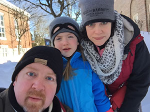 Carolyn Baeumler with husband and daughter.